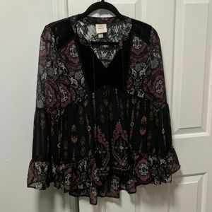 Flowy sheer top with bell sleeves